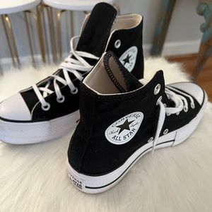 Converse high top platform black/white size 7US.